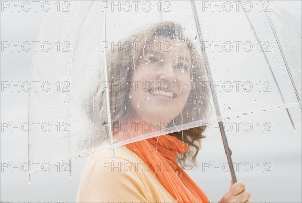 Woman with umbrella.