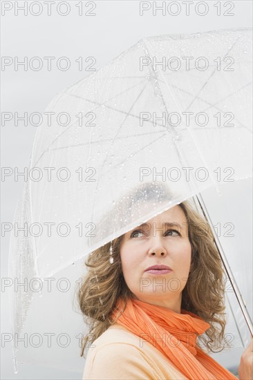 Woman with umbrella.