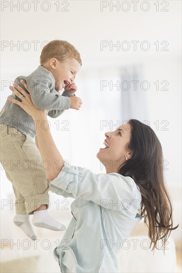 Mother playing with son (12-17 months).