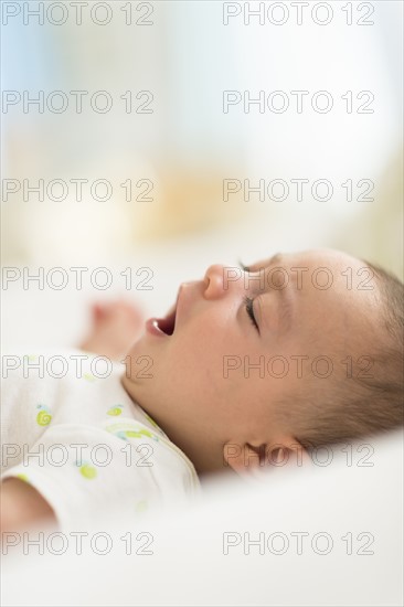 Baby boy (2-5 months) yawing.