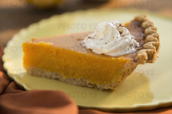 Slice of homemade pumping pie on plate.
Photo : Jamie Grill