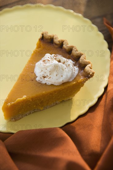 Slice of homemade pumping pie on plate.
Photo : Jamie Grill