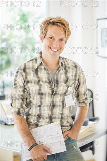 Portrait of IT department employee.
Photo : Daniel Grill
