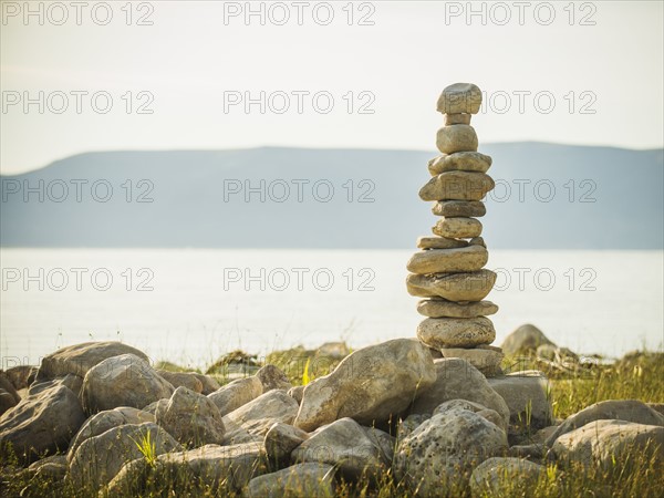 Stack of stones by lake. USA, Utah, Bear Lake.