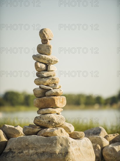 Stack of stones by lake. USA, Utah, Bear Lake.