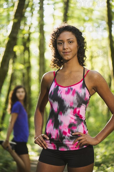 Two young women exercising. USA, Oregon, Portland.