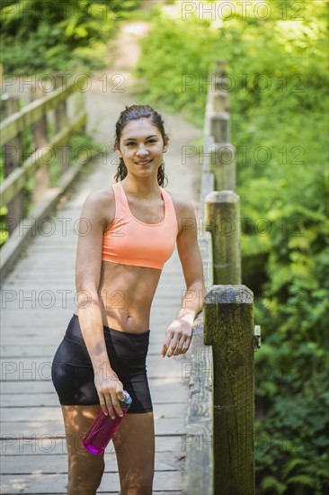 Young women resting after exercising. USA, Oregon, Portland.