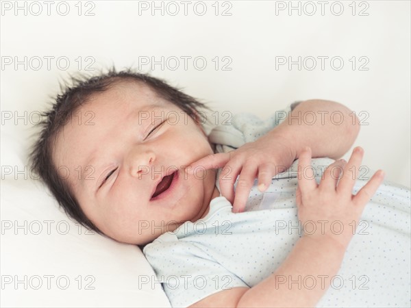 Portrait of newborn baby boy (0-1 months).
