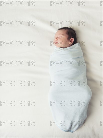 Portrait of newborn baby boy (0-1 months).