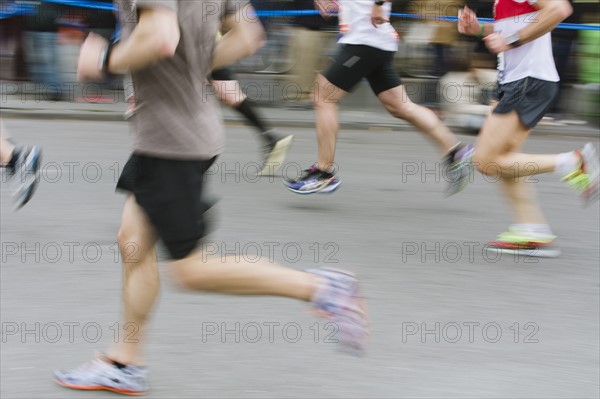 Marathon runners in action. USA, New York State, New York City.
Photo : Kristin Lee