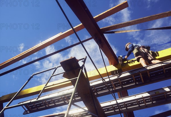 Construction worker working on construction site. USA, Colorado.
Photo : Kelly