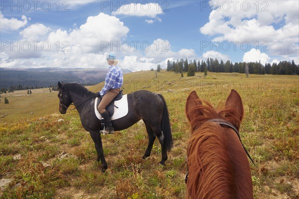 Woman riding horse. USA, Western USA, Colorado.
Photo : Kelly