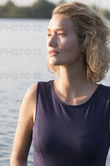 Beautiful woman standing in lake.
Photo : Jan Scherders