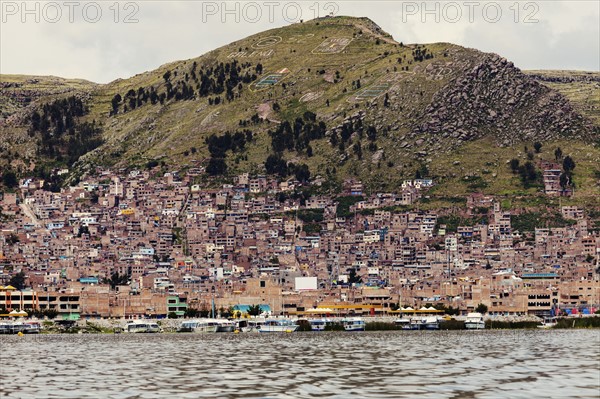 View of city from Titicaca Lake. Peru, Puno.
Photo : Henryk Sadura