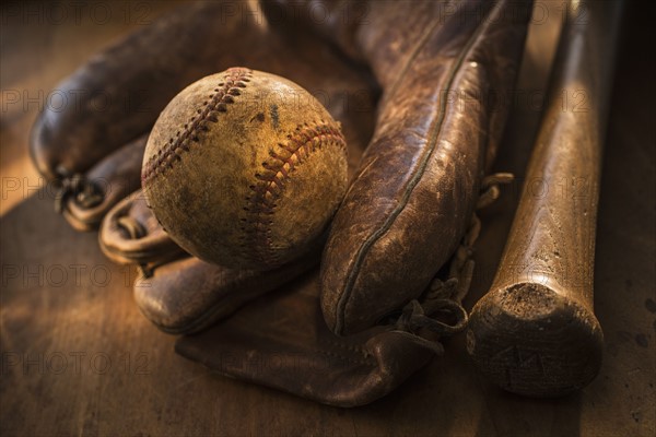 Antique baseball, glove and bat.