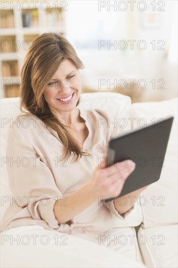 Woman using tablet pc.