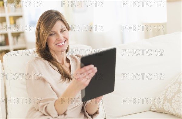 Woman using tablet pc.