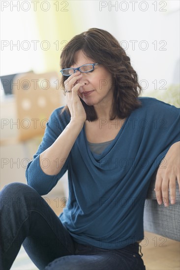 Woman having headache.