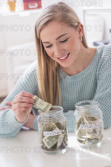 Woman collecting savings.