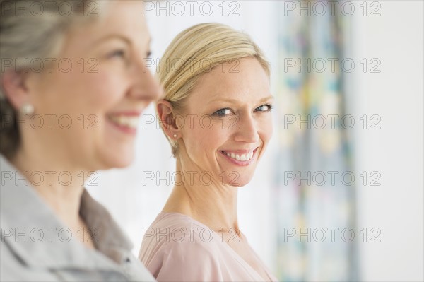 Profiles of two mature women.