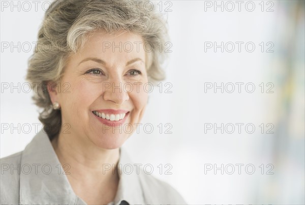 Portrait of smiling woman.