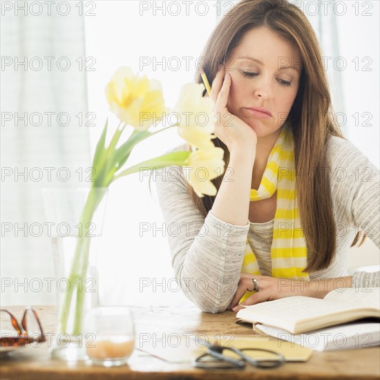 Portrait of woman at desk.