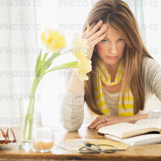 Portrait of woman at desk.