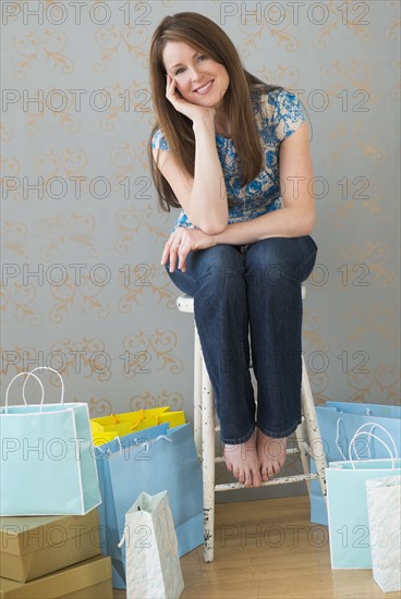 Portrait of woman with shopping bags.