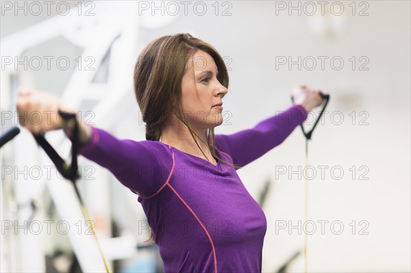 Portrait of woman exercising.