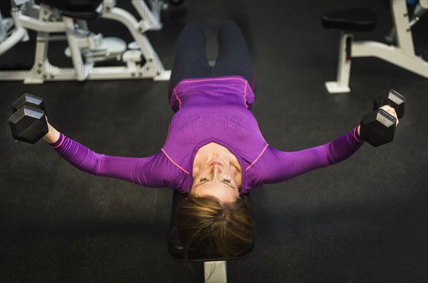 Portrait of woman exercising.