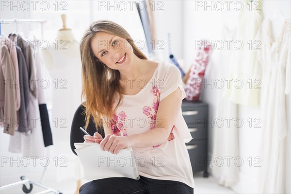 Portrait of female costume designer in studio.