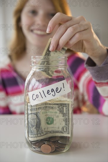 Jar with money.
Photo : Jamie Grill