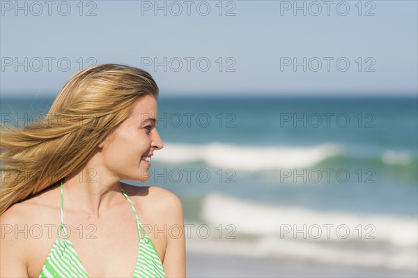 Portrait of young woman on beach. Jupiter, Florida, USA.
Photo : Daniel Grill