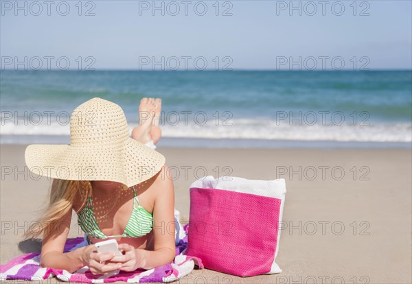 Young woman on beach. Jupiter, Florida, USA.
Photo : Daniel Grill