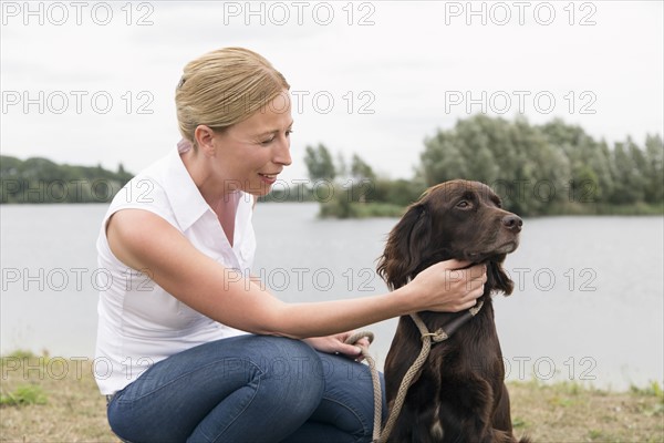 Portrait of woman with dog. Netherlands.
Photo : Mark de Leeuw