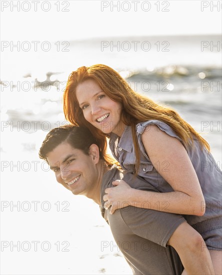 Portrait of couple on beach.