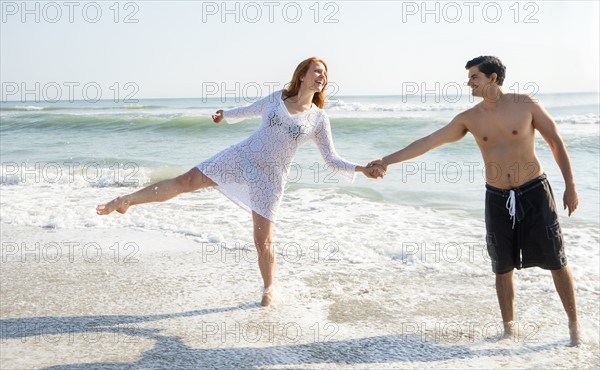 View of couple on beach.