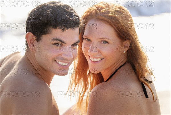 Portrait of couple on beach.