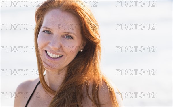 Portrait of woman on beach.