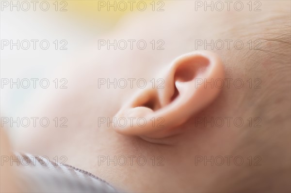 Close up of baby boy's(2-5 months) ear.
