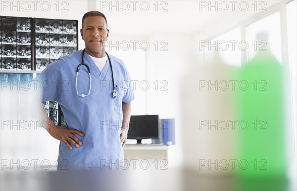 Portrait of male doctor in hospital.