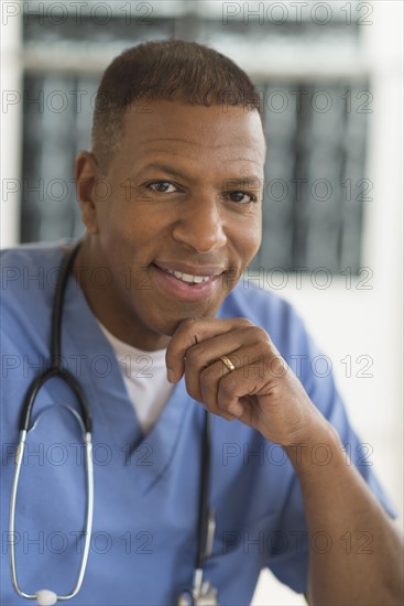 Portrait of male doctor in hospital.