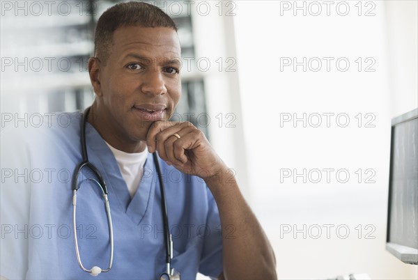 Portrait of male doctor in hospital.