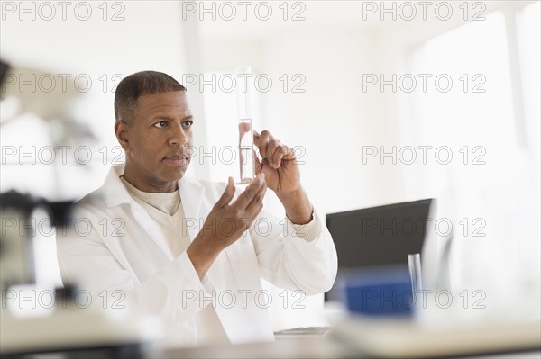 Male technician working in laboratory.