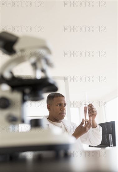 Male technician working in laboratory.