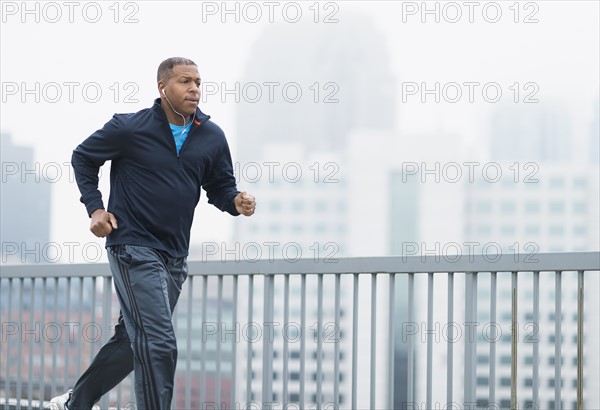 Man running in city.