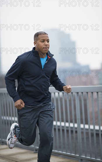 Man running in city.