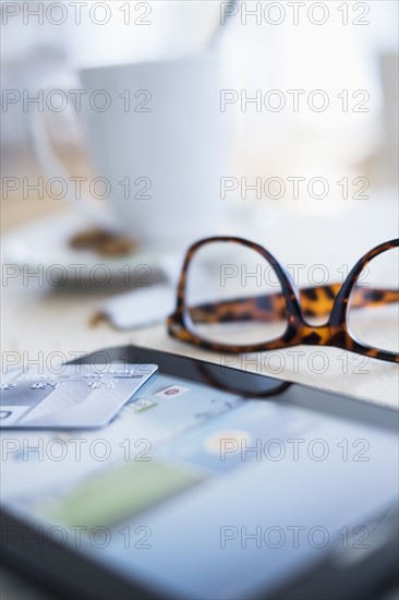 Close up of credit card on digital tablet.