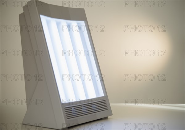 Studio Shot of sun lamp on white background.
Photo : Jamie Grill