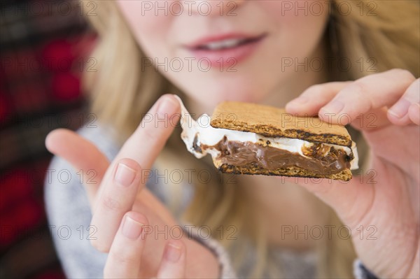 Woman holding smores.
Photo : Jamie Grill